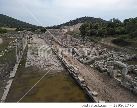 Aerial view of Patara colonnaded street and harbor canal in Antalya, Turkiye Aerial view of Patara colonnaded street and harbor canal in Antalya, Turkiye 129561770