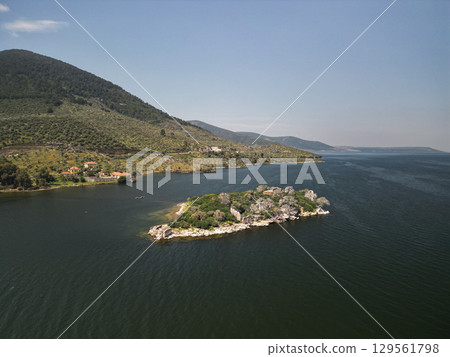 Aerial view of small islet on lake bafa near didim in aydin, Turkey coast Aerial view of small islet on lake bafa near didim in aydin, Turkey coast 129561798