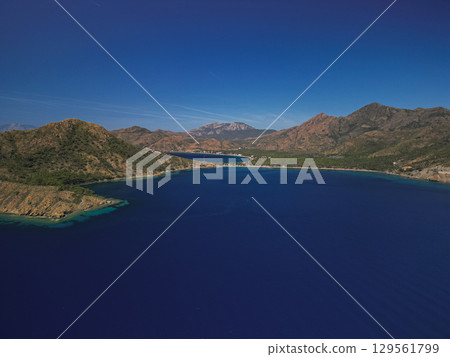 Ancient Roman amphitheater overlooking crystal clear Mediterranean bay Turkey Ancient Roman amphitheater overlooking crystal clear Mediterranean bay Turkey 129561799