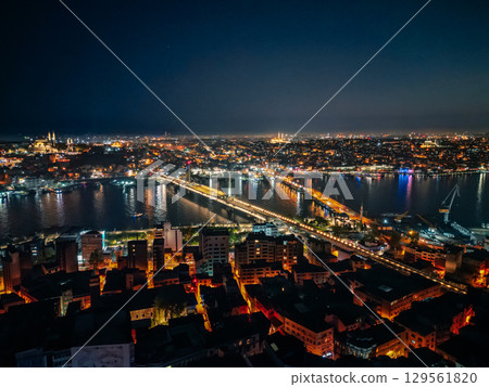 Aerial view of Istanbul skyline and Golden Horn with Galata Bridge lit, Turkey Aerial view of Istanbul skyline and Golden Horn with Galata Bridge lit, Turkey 129561820