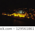 Aerial view of illuminated medieval fortress walls in Marmaris at night 129561861