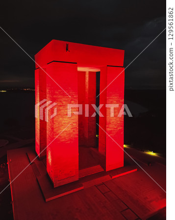 Turkey: Close-up view of illuminated Canakkale memorial pillars at night 129561862