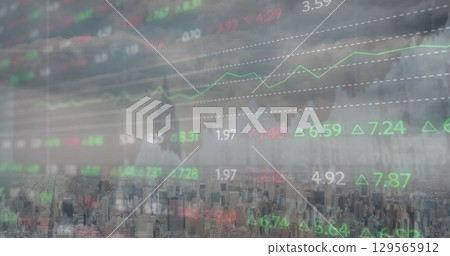 Image of financial graph and data processing over cityscape 129565912