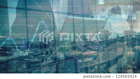 Image of financial graph and data processing over person using tablet 129565914