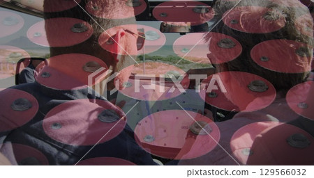 Image of diverse male friends driving car over lockers 129566032