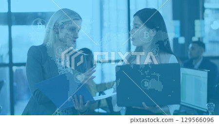 Image of data processing over business people using electronic devices Image of data processing over business people using electronic devices 129566096