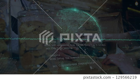 Image of data processing over hand paying with smartphone 129566219