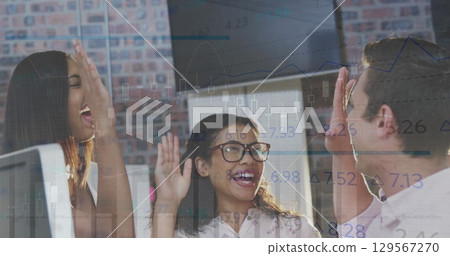 Image of data processing over diverse business people high fiving 129567270