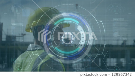 Image of scope scanning with data processing over caucasian male worker 129567342