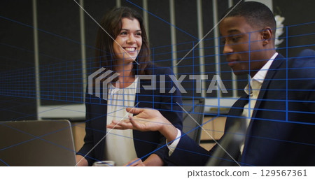 Image of blue lines over diverse business people at office Image of blue lines over diverse business people at office 129567361