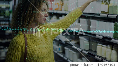 Image of financial data processing over caucasian women shopping Image of financial data processing over caucasian women shopping 129567403