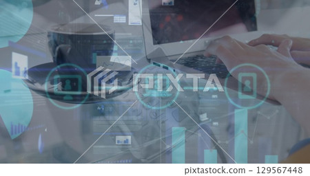 Image of data processing over hands using laptop 129567448