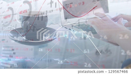 Image of data processing over hands using laptop 129567466