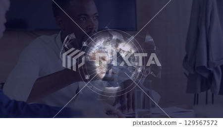 Image of network of connections and icons over african american businessman 129567572