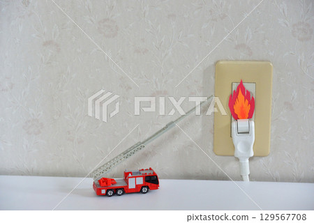 Image of a fire starting from an outlet 129567708