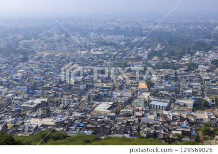 View of Chittorgarh townscape in the morning mist from Chittorgarh Fort View of Chittorgarh townscape in the morning mist from Chittorgarh Fort 129569026