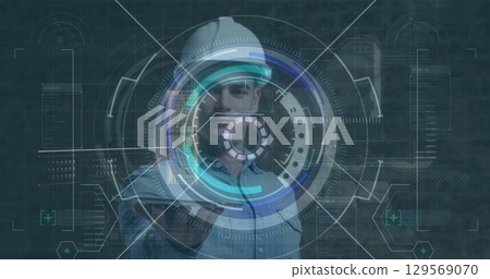 Image of scope scanning with data processing over caucasian male worker Image of scope scanning with data processing over caucasian male worker 129569070