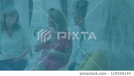 Image of financial data processing over diverse people at meeting Image of financial data processing over diverse people at meeting 129569144
