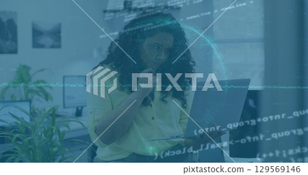 Image of financial graphs, globe and data over woman using laptop in office Image of financial graphs, globe and data over woman using laptop in office 129569146