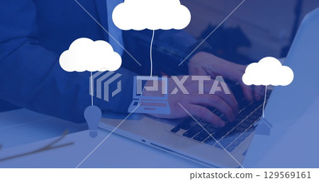 Image of technology icons over businessman using computer Image of technology icons over businessman using computer 129569161