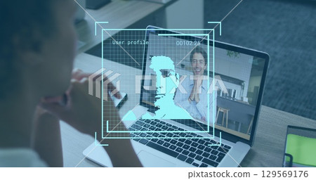 Image of user photo over african american woman having image call on laptop 129569176