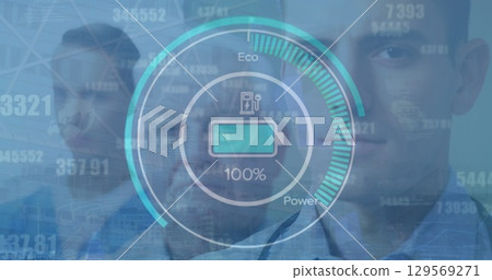 Image of graphical electric car gauge indicator showing battery charging over caucasian doctors 129569271