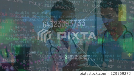 Image of moving trading board, programming codes over smiling caucasian male doctors discussing Image of moving trading board, programming codes over smiling caucasian male doctors discussing 129569273