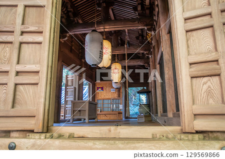 Kaizando, Traditional interior view through wooden doors at Engyoji mountain Shosha, Himeji, Japan Kaizando, Traditional interior view through wooden doors at Engyoji mountain Shosha, Himeji, Japan 129569866