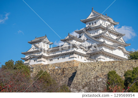 Himeji castle, Historic Japanese castle against blue sky at Himeji, Japan Himeji castle, Historic Japanese castle against blue sky at Himeji, Japan 129569954