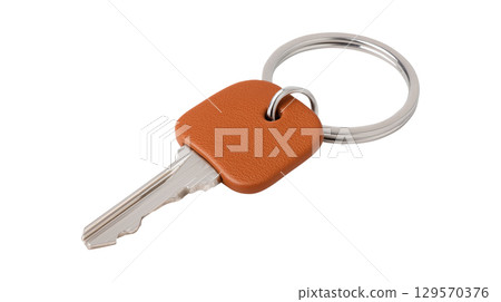 A single house or office key with a brown leather fob, symbolizing security, access, and property 129570376