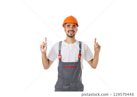 Enthusiastic male worker in safety helmet, isolated on white, PNG 129570448