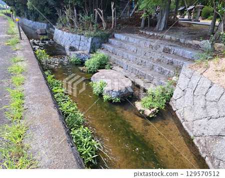 water flowing in waterway 129570512