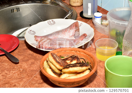 Storing food on the kitchen counter. Storing food on the kitchen counter. 129570701
