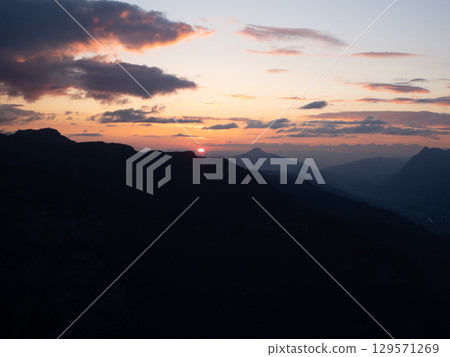 Grenairon, France - September 2nd 2024: Beautiful view over the valleys and mountains during sunset Grenairon, France - September 2nd 2024: Beautiful view over the valleys and mountains during sunset 129571269