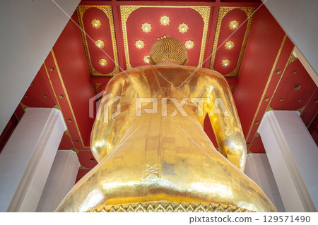 Wat Chaiwatthanaram temple, Ayutthaya historical park, Ayutthaya, Thailand Golden Buddha statue under ornate ceiling 129571490