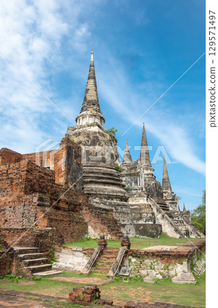 Wat Phra Si Sanphet, Ayutthaya historical park, Ayutthaya, Thailand Historic temple with ancient pagodas and blue sky. 129571497