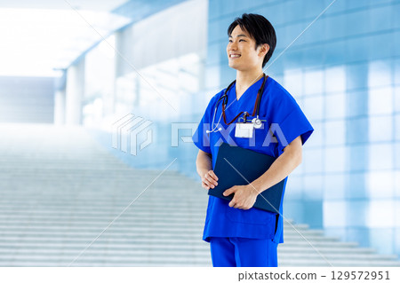 Young doctor working in a hospital 129572951
