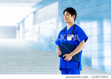 Young doctor working in a hospital 129572953