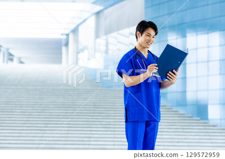 Young doctor working in a hospital 129572959