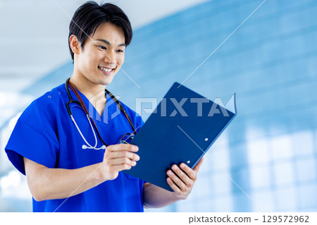 Young doctor working in a hospital 129572962
