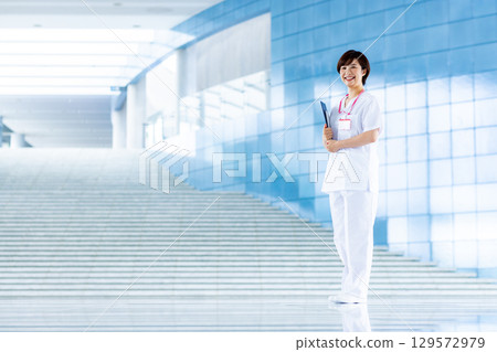 Young nurse working at the hospital 129572979