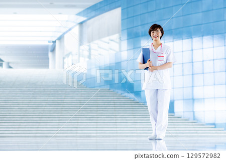 Young nurse working at the hospital 129572982