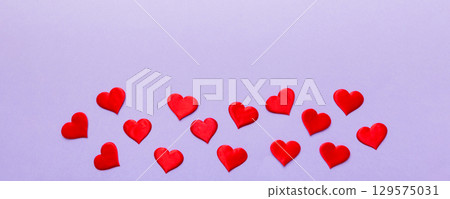 Valentine day background with red hearts, top view with copy space 129575031