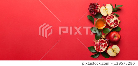 Flat lay composition with symbols jewish Rosh Hashanah holiday attributes on colored background, Rosh hashanah concept. New Year holiday Traditional. Top view with copy space Flat lay composition with symbols jewish Rosh Hashanah holiday attributes on colored background, Rosh hashanah concept. New Year holiday Traditional. Top view with copy space 129575290