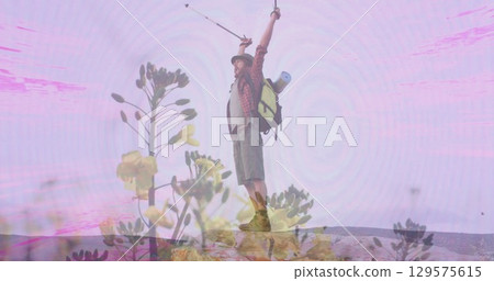 Image of pink shapes over caucasian male hiker Image of pink shapes over caucasian male hiker 129575615