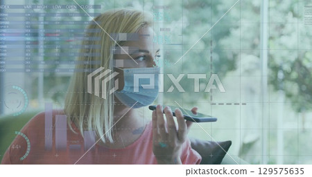 Image of data processing over caucasian women wearing face mask using smartphone Image of data processing over caucasian women wearing face mask using smartphone 129575635