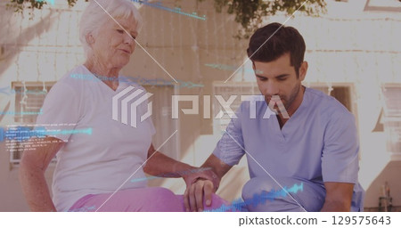 Image of data over caucasian senior woman and male physiotherapist Image of data over caucasian senior woman and male physiotherapist 129575643