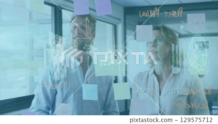 Image of dna helix, digital brain and data over caucasian coworkers discussing in meeting room Image of dna helix, digital brain and data over caucasian coworkers discussing in meeting room 129575712
