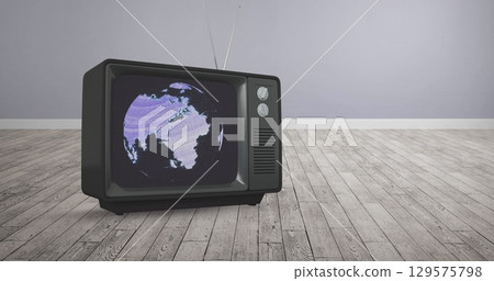 Image of vintage tv with globe over wooden background Image of vintage tv with globe over wooden background 129575798
