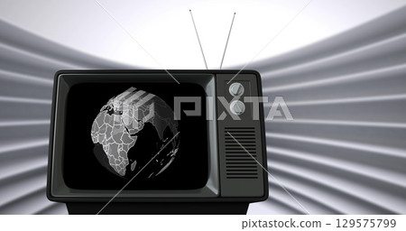 Image of vintage tv and globe on grey background 129575799